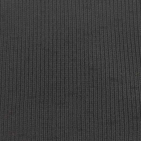 Close-up of a dark charcoal gray ribbed knit fabric texture.
