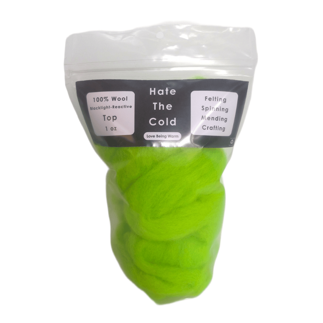 Wool top in fluorescent green in a package with "Hate The Cold" on the label
