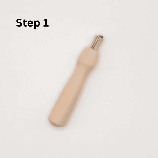 Wooden felting needle on a white background with 'Step 1' text.