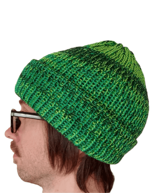 100% baby alpaca beanie in a mix of three different shades of green