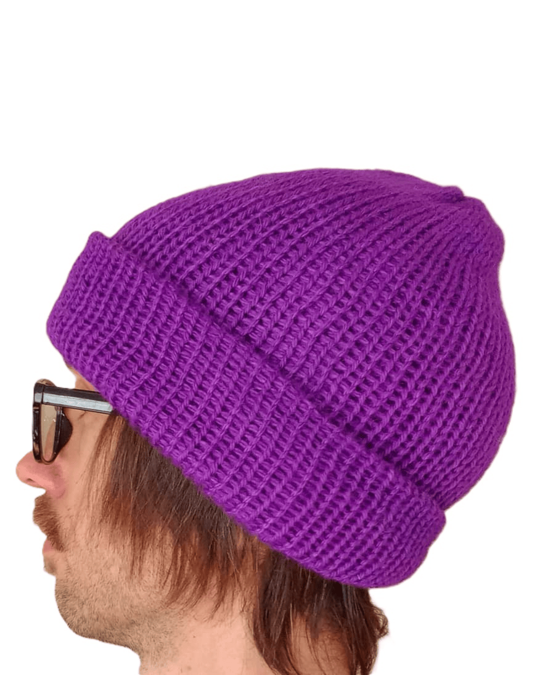 100% baby alpaca beanie in purple on a model