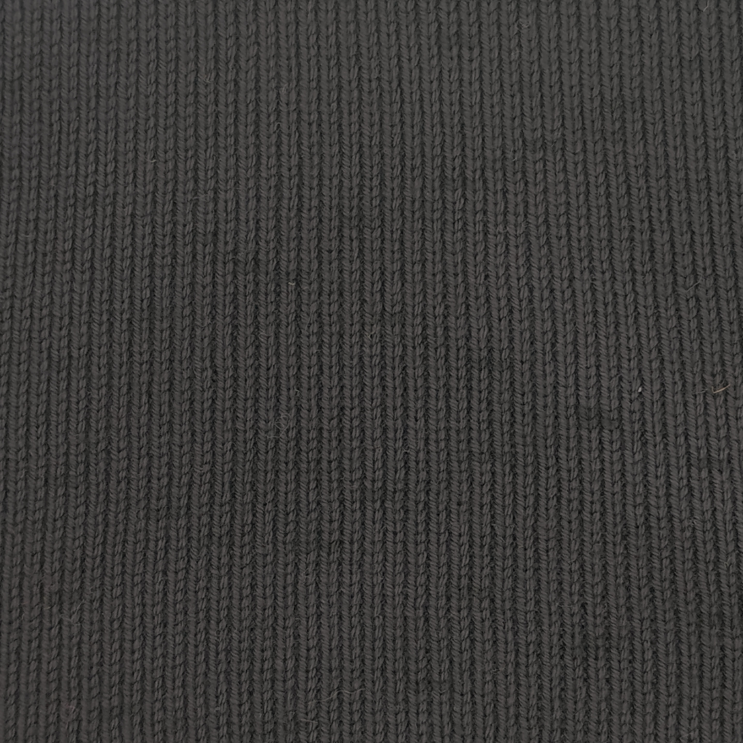 Close-up of a dark charcoal gray ribbed knit fabric texture.