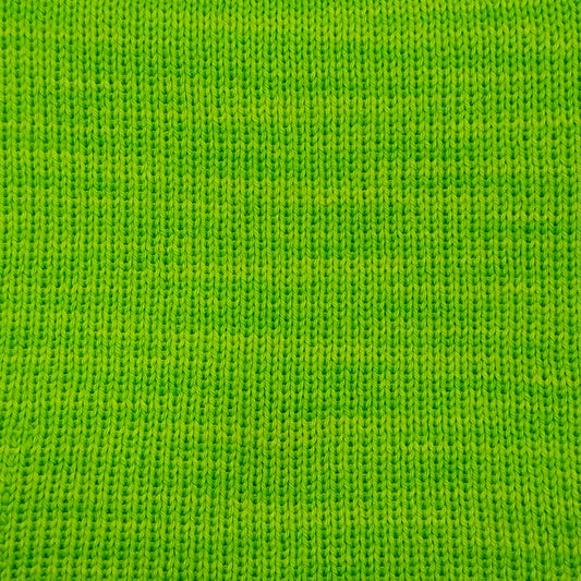 A close-up of fluorescent green knit merino wool in fingering weight.