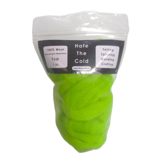 Wool top in fluorescent green in a package with "Hate The Cold" on the label