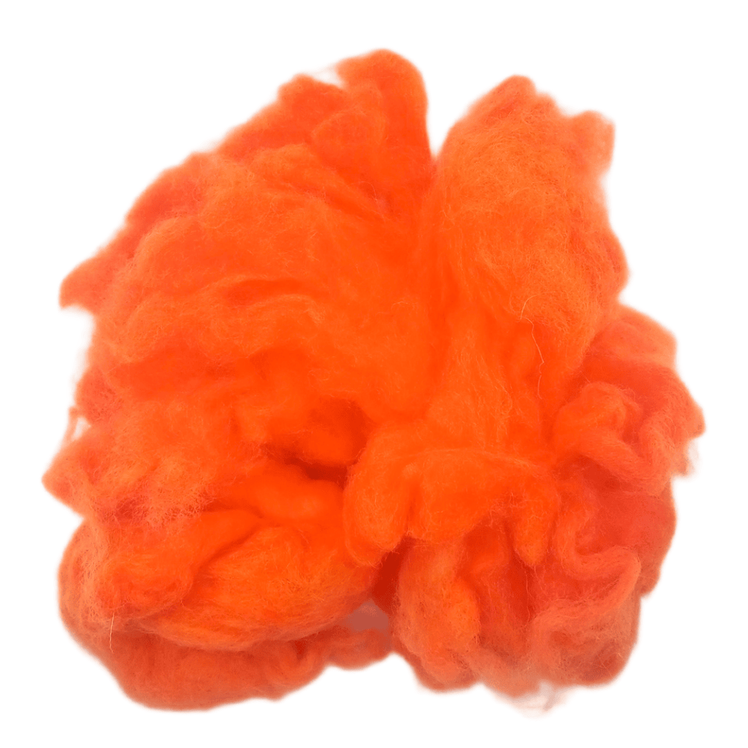 Fluorescent orange wool roving on a white background