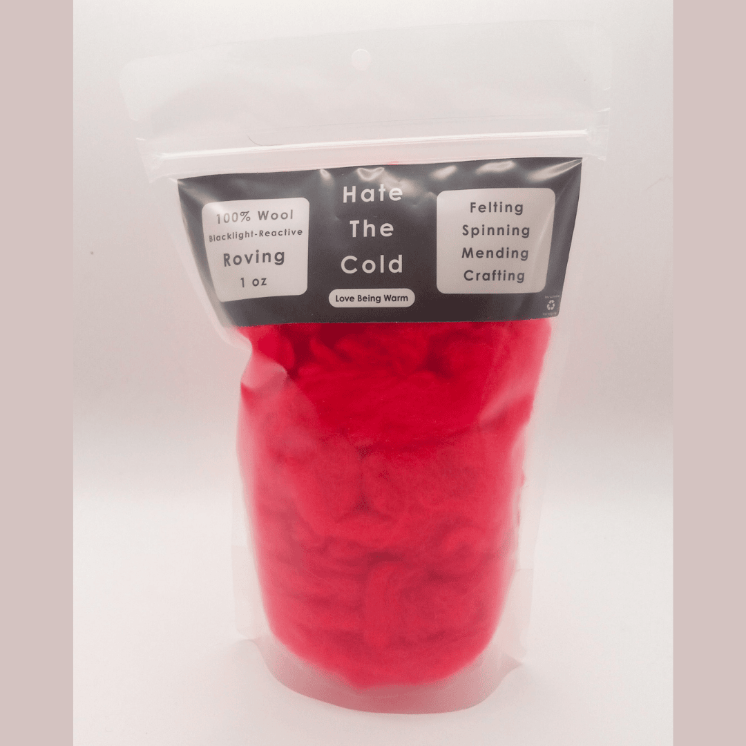 Fluorescent red wool roving on a white background