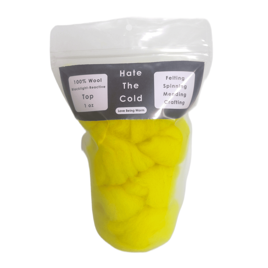 Wool top in fluorescent yellow in a package with "Hate The Cold" on the label
