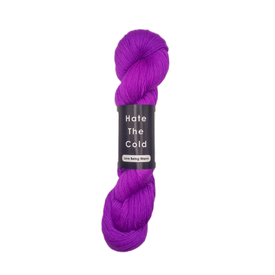 100% Peruvian baby alpaca yarn in fluorescent purple, fingering weight.