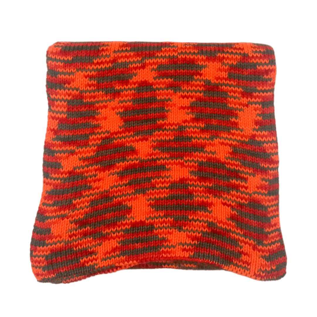 100% Australian Merino Wool scarf in variegated orange, green, and red.