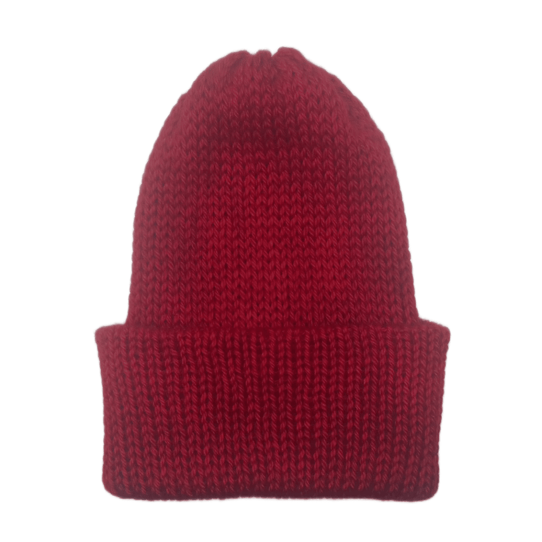 Red knit alpaca beanie on a white background
