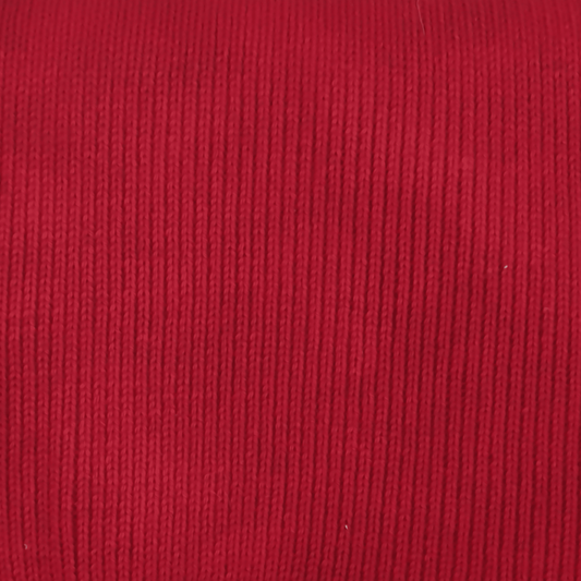 A close-up of a red knit merino wool.