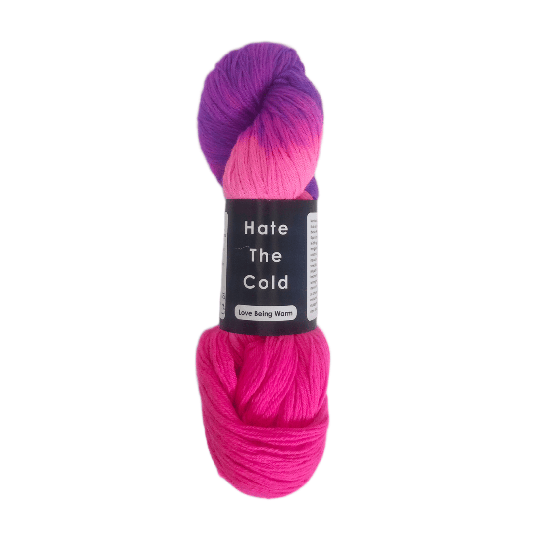 Hand-dyed yarn made of 100% merino wool in a variegated mix of light pink, dark pink, and purple.
