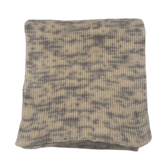 100% Peruvian Baby Alpaca scarf with a textured pattern of blue dots on a natural white background