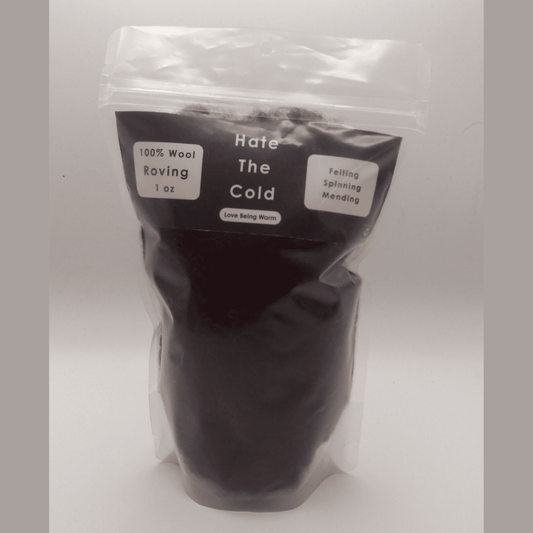 Brown wool roving in a package with "Hate The Cold" on the label