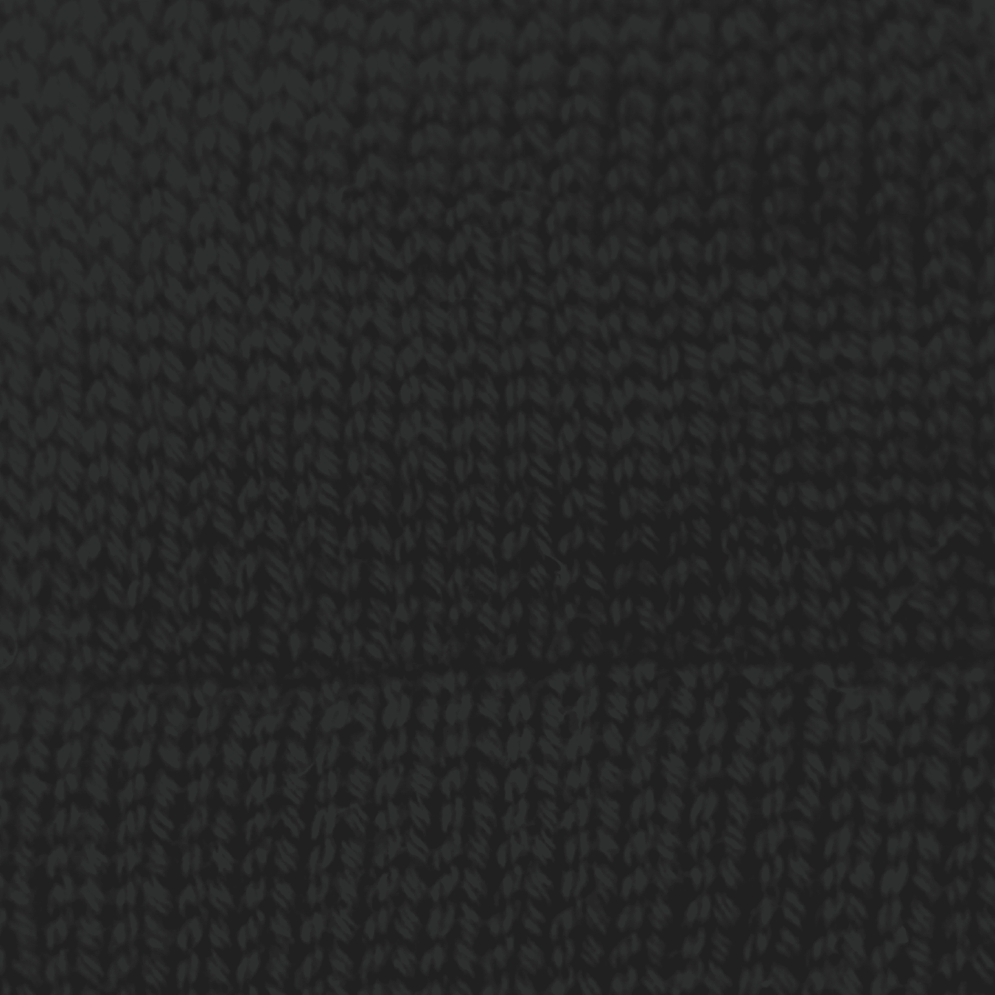 Close-up of worsted weight knit alpaca in black
