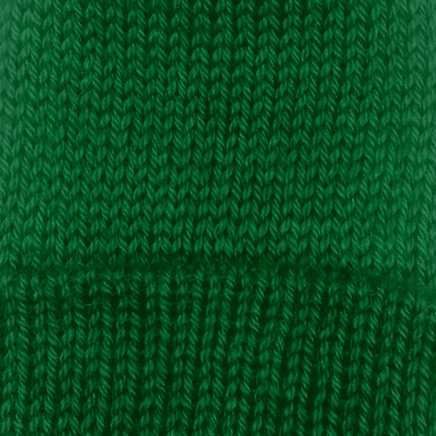 A close-up of a vibrant green ribbed knit fabric texture.