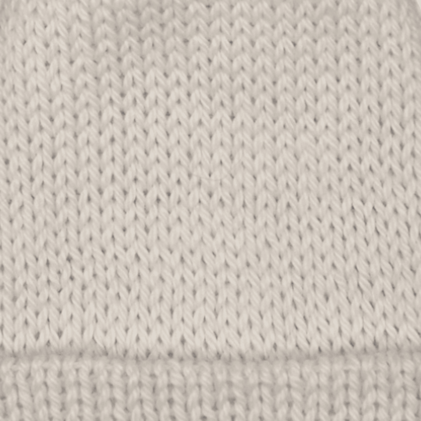 Close-up of worsted weight knit alpaca in white