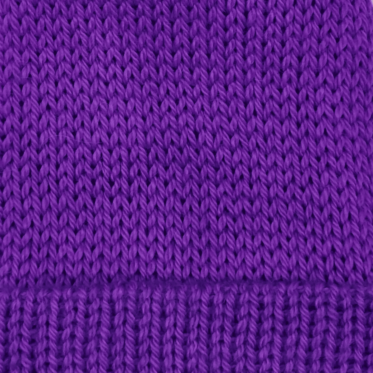 A close-up of a purple knit fabric texture.